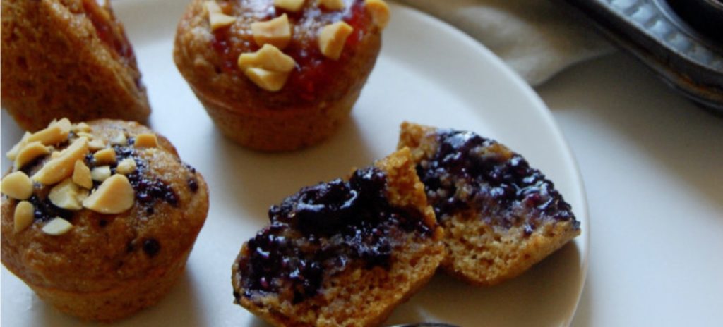 Peanut Butter and Jelly muffins made with powdered peanut butter. 